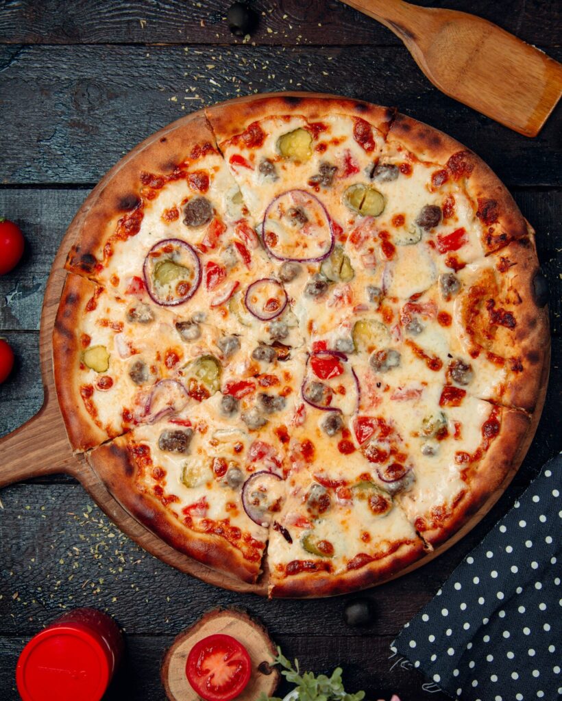 pizza-with-mixed-ingredients-cheese-top_114579-3438